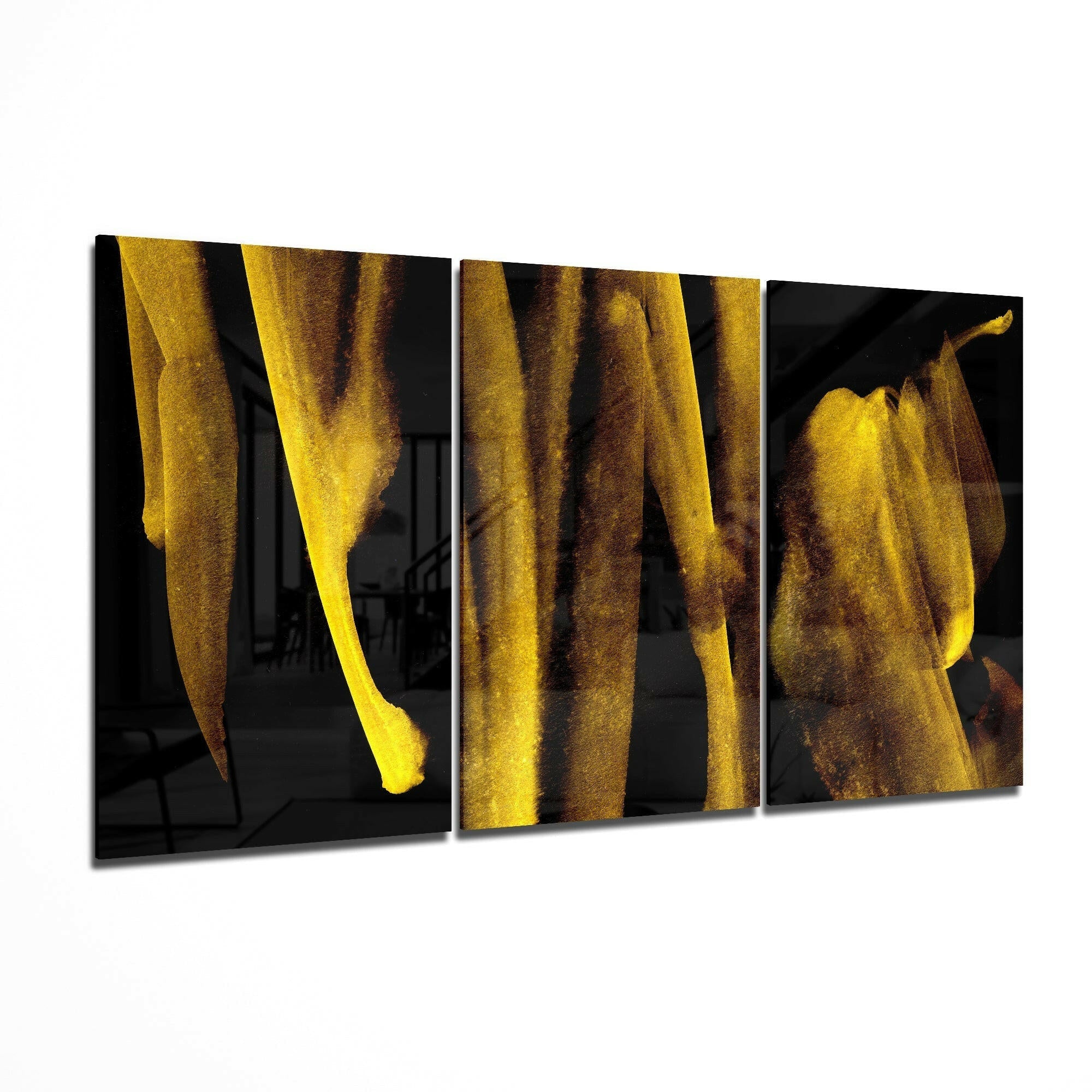Four-panel abstract artwork with yellow and black colors on a white background